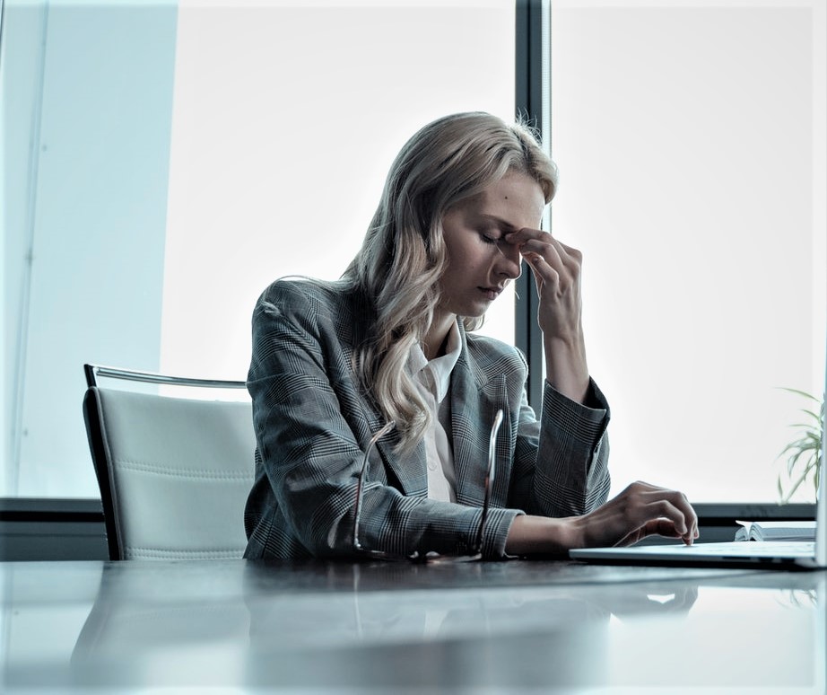 A lady feeling stressed out.